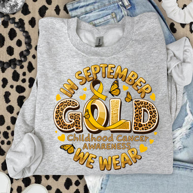 In September We Wear Gold Childhood Cancer Awareness DTF Transfer DTF Heat Press Transfer from Sweet Tee Transfers