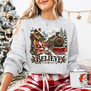 Vintage Santa Christmas Train Station Believe DTF Transfer DTF Heat Press Transfer from Sweet Tee Transfers