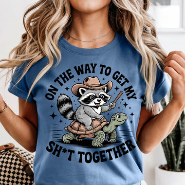 On the Way to Get My Sh*t Together Raccoon Riding Turtle DTF Transfer DTF Heat Press Transfer from Sweet Tee Transfers