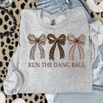 Run the Dang Ball Football Bows DTF Transfer DTF Heat Press Transfer from Sweet Tee Transfers
